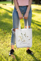 White canvas tote bag with botanical plants print and logo, open top with short handles