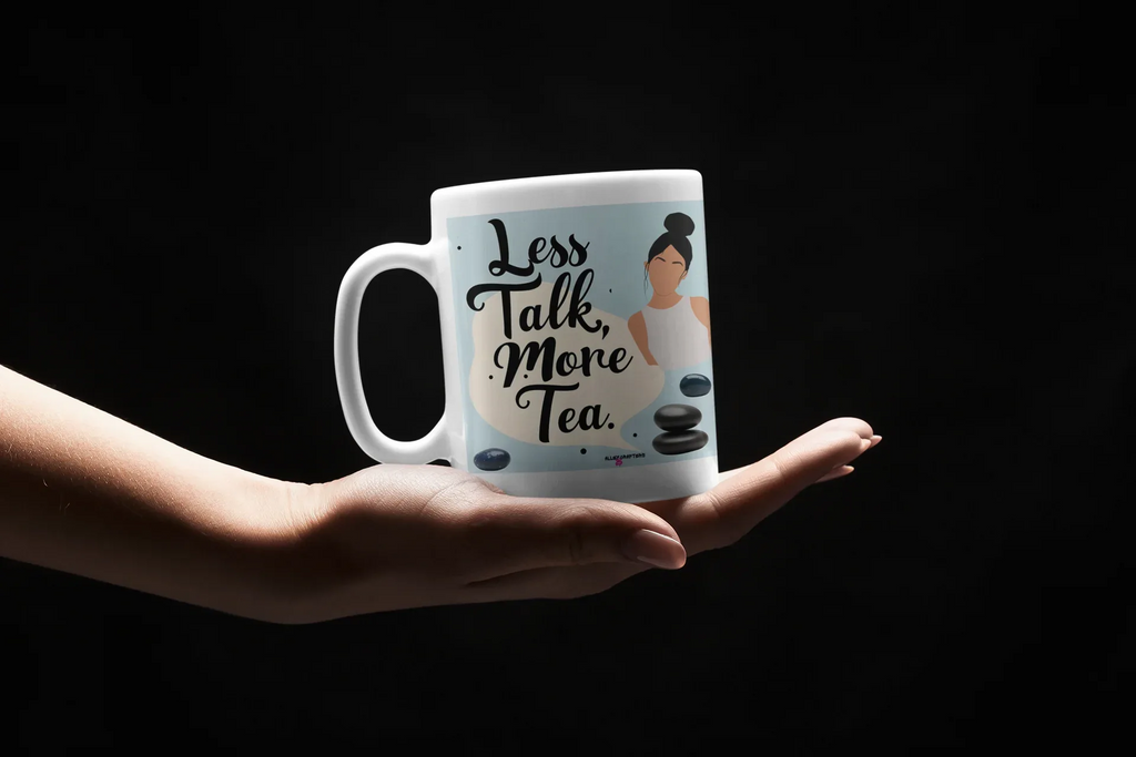 White tea mug with handle and 'Less Talk, More Tea' text on front