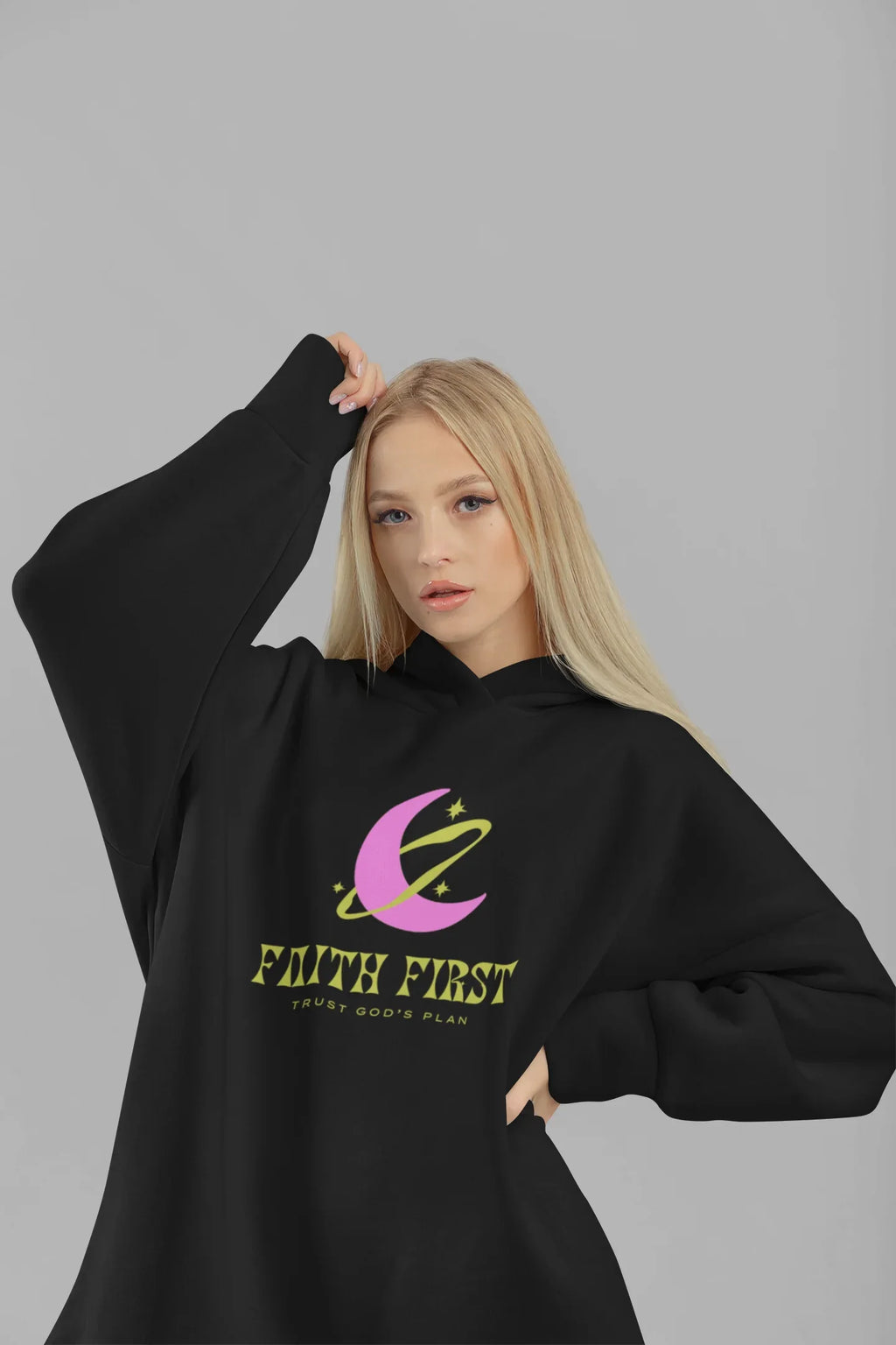 Black unisex hoodie with front Faith First logo and crescent graphic