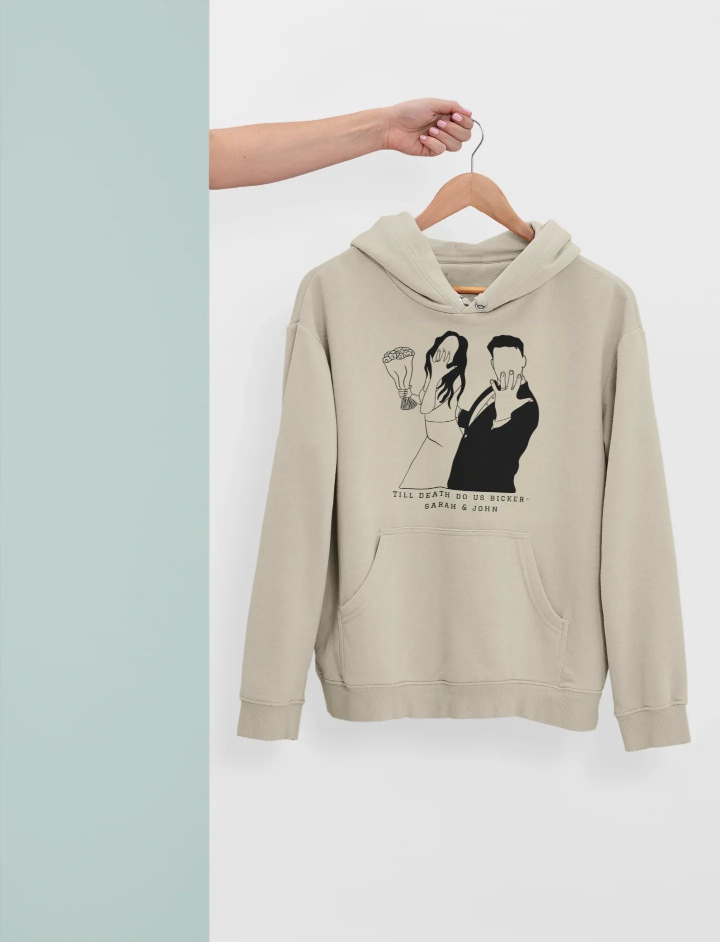 Personalised sand hoodie on hanger, hooded sweatshirt with couple line-art graphic on front