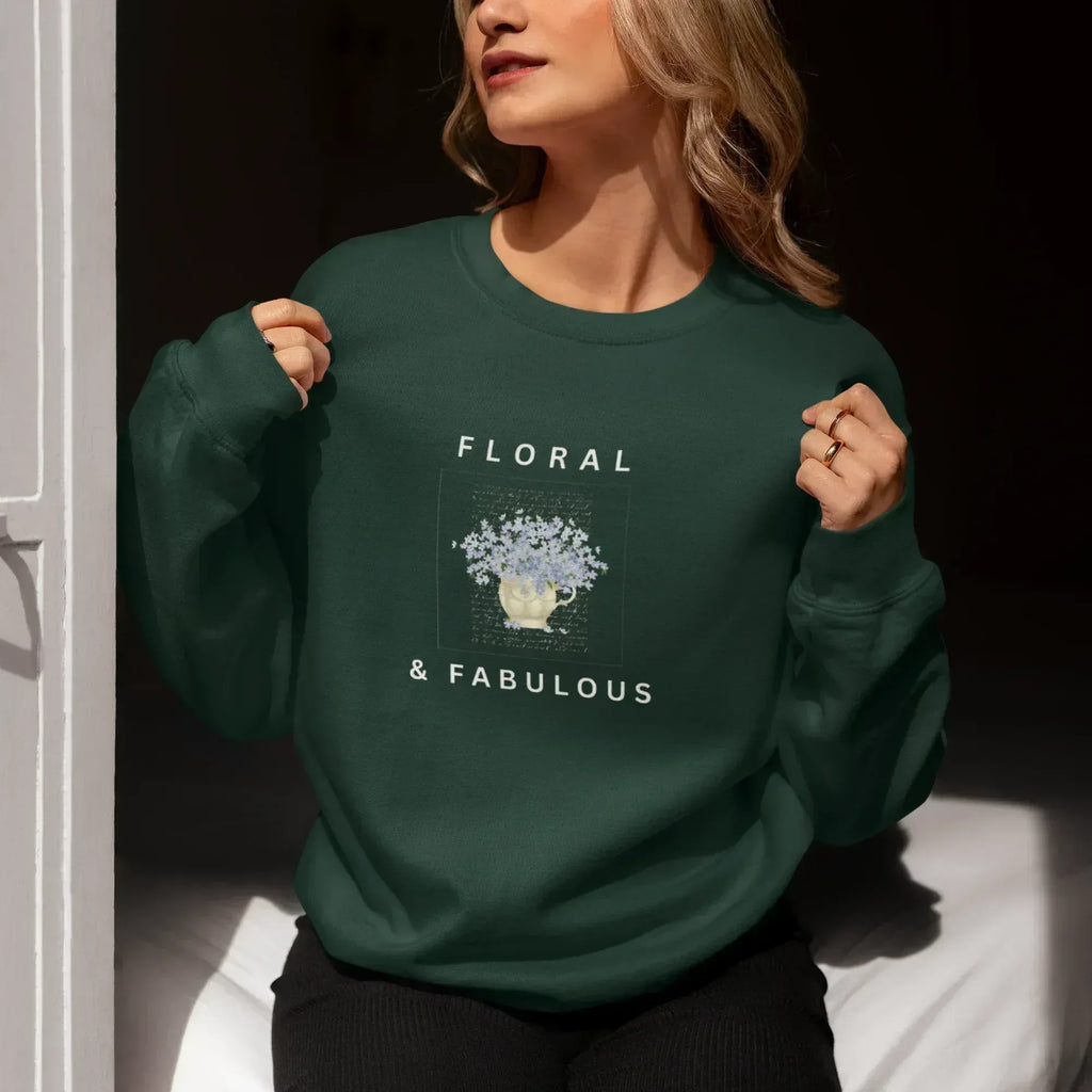Dark green sweatshirt with floral graphic and "FLORAL" and "& FABULOUS" text