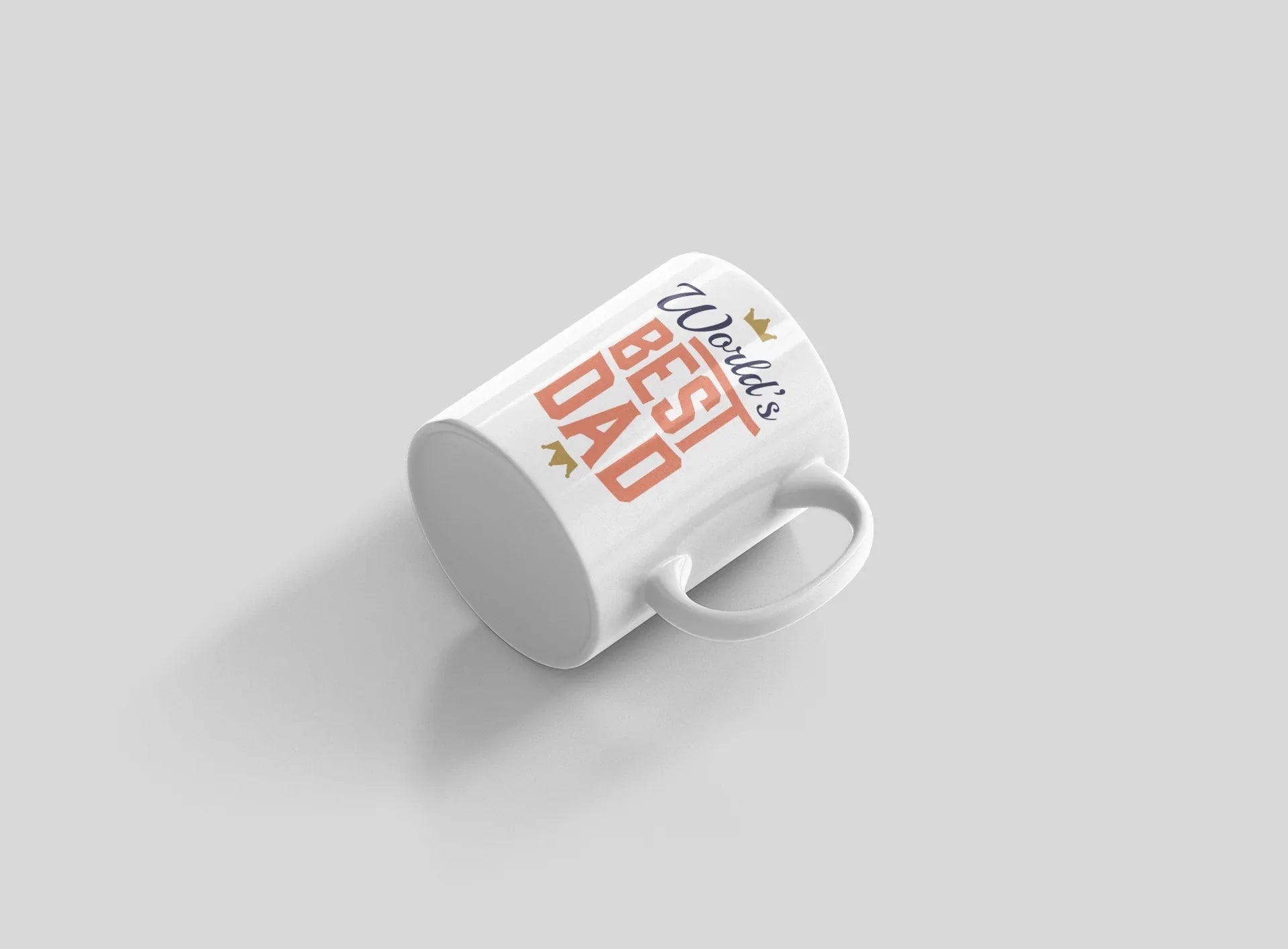 White mug with World's Best Dad crown and red stacked letters, angled view.