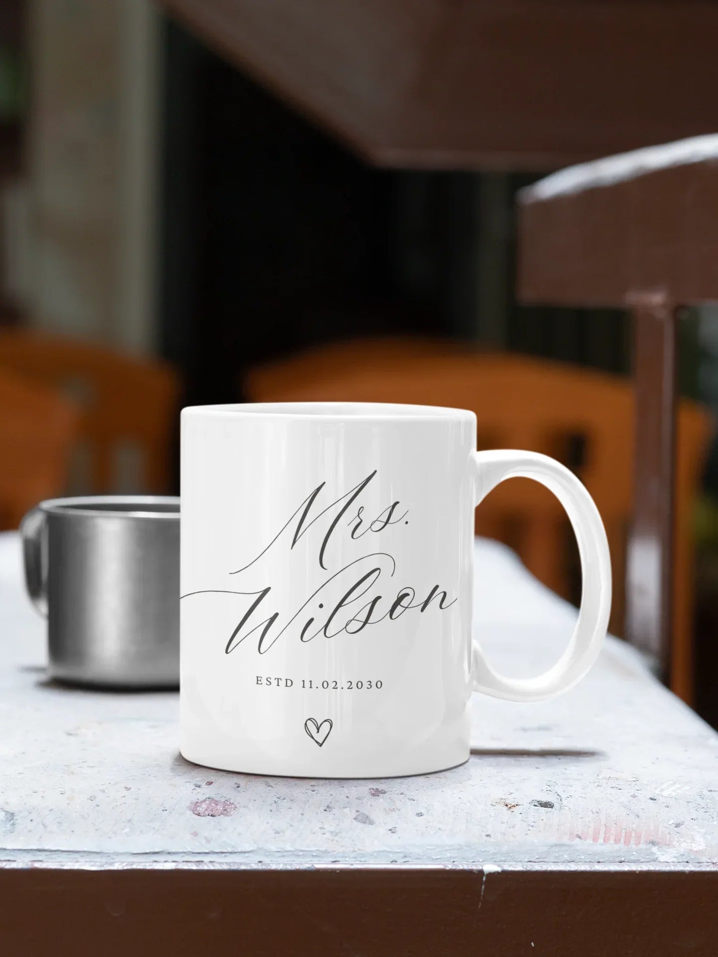 White ceramic mug with 'Mrs Wilson' script and heart, 'ESTD 11.02.2030' printed