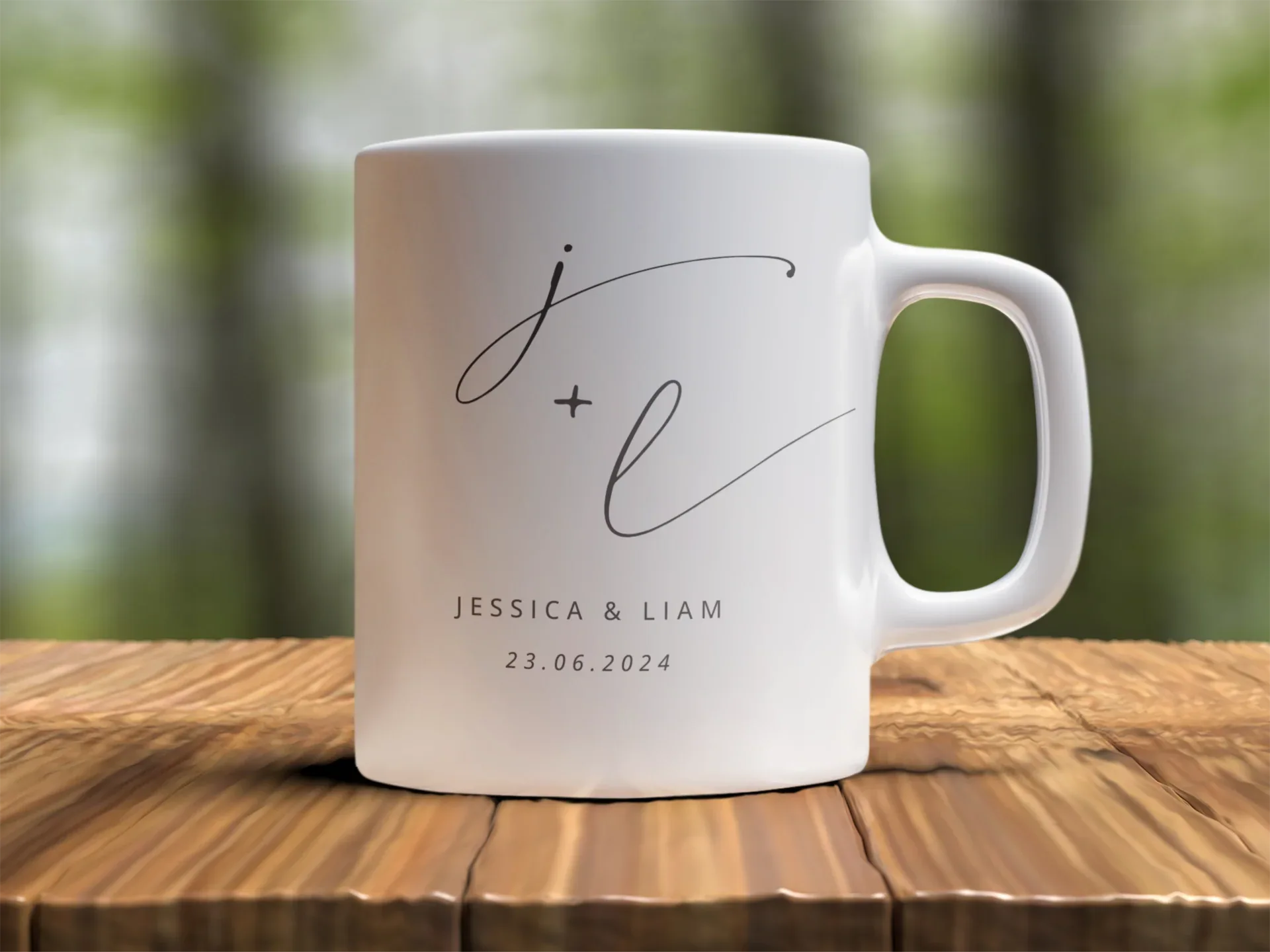 White ceramic mug with monogram j + l and date 23.06.2024, printed on front.