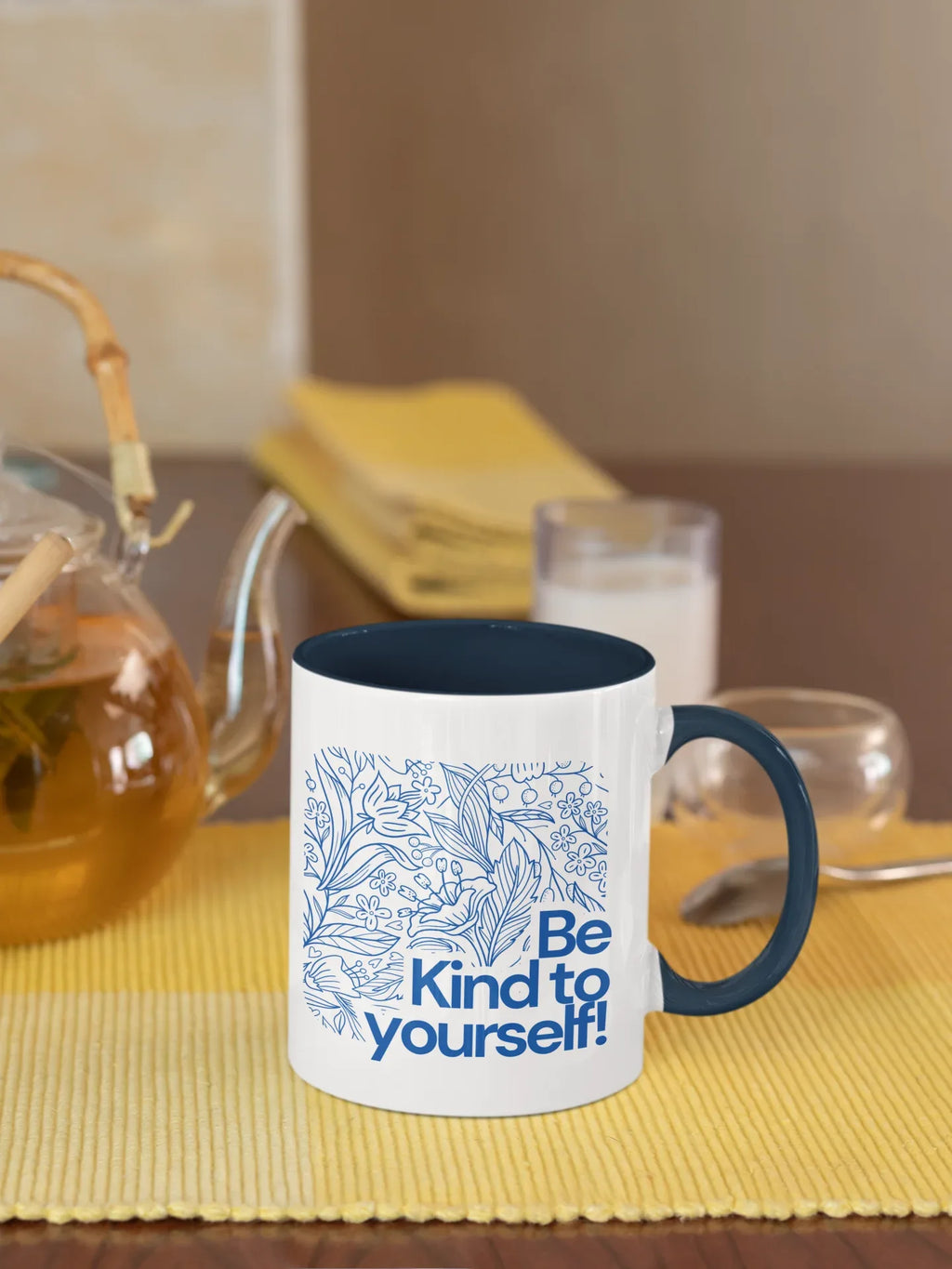 Navy accent coffee mug with blue floral line art and 'Be Kind to yourself!' wording