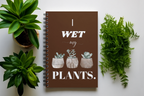 A5 spiral notebook, brown cover with “I wet my plants” text and succulent pot illustrations.