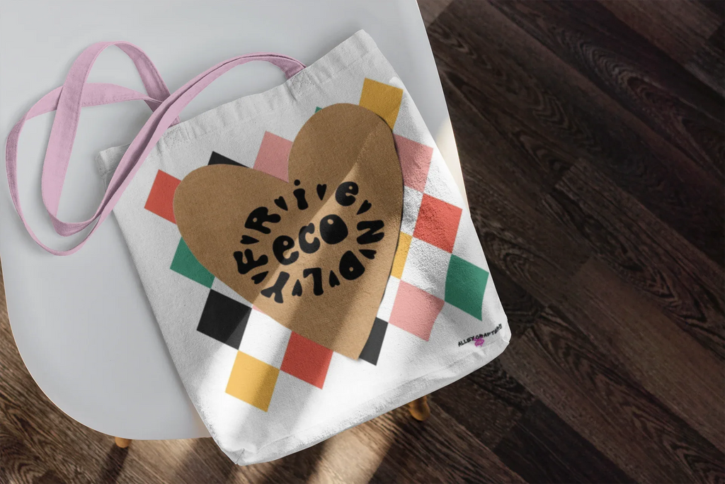 White canvas tote bag with heart logo, multicolor diamond pattern, pink handles
