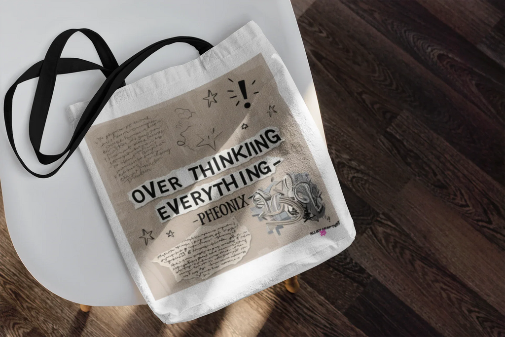 White tote bag with black handles, 'OVER THINKING EVERYTHING - Pheonix' front print