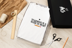 Unisex T-shirt, white crew neck, 'Teaching is a work of heart' centered chest print
