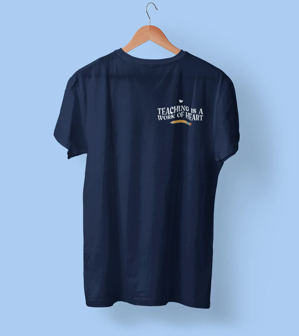 Navy unisex t-shirt with “Teaching is a work of heart” heart-and-text graphic