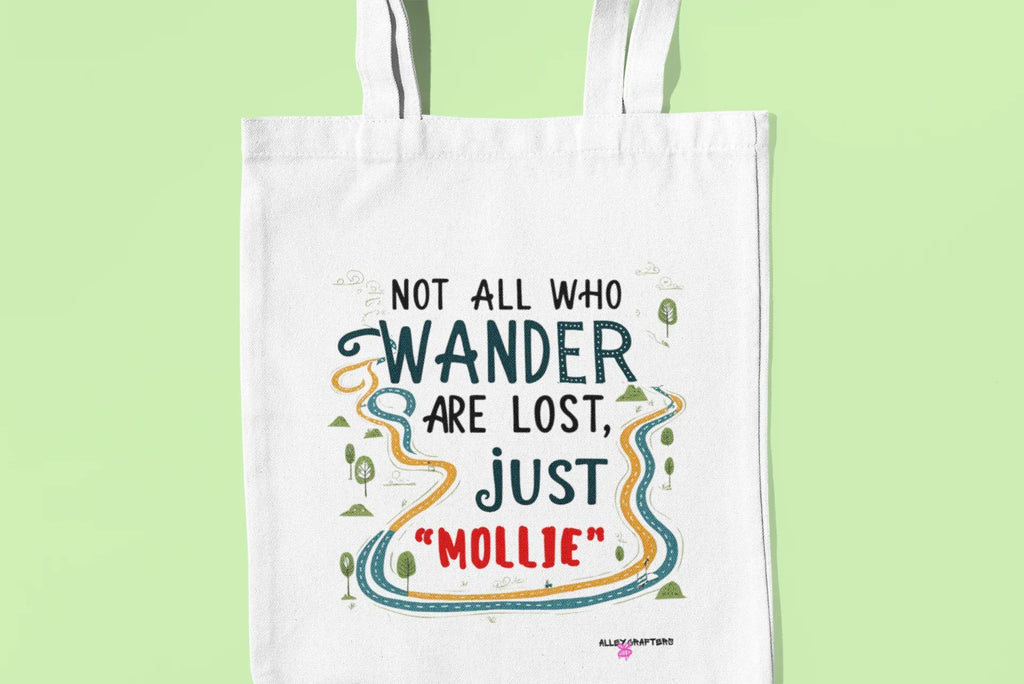White tote bag with printed quote graphic reading 'MOLLIE' in color