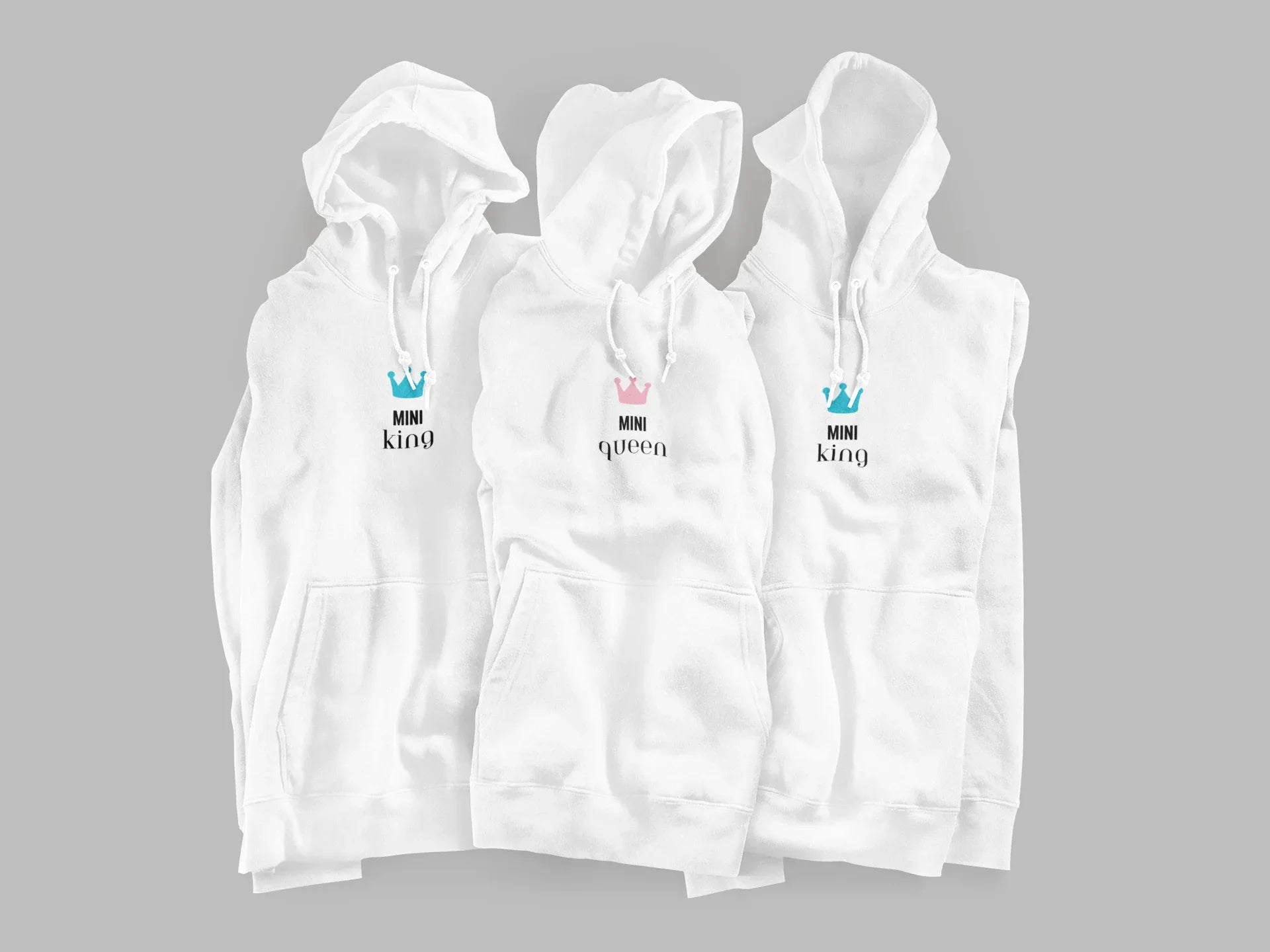 Three white hooded sweatshirts with blue crown and 'Mini Queen/king' chest designs