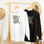 White and black hoodies with front "Stay Trippy Little Hippie" star text graphic