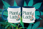 Pair of white ceramic coffee mugs with blue handles, Plant Lady graphic on front