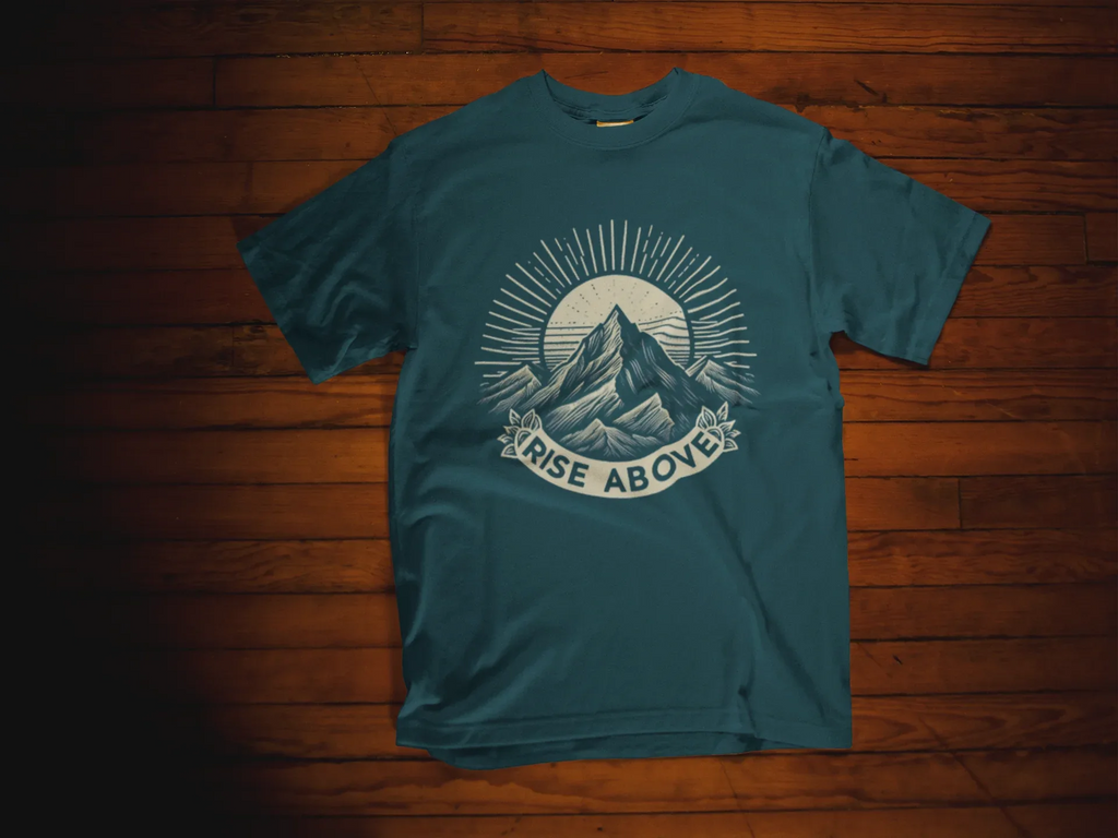 Teal short-sleeve T-shirt with mountain sunrise “RISE ABOVE” graphic