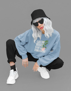 Light blue sweatshirt with “Grow What You Go Through” text and leaf graphic