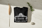 Black Monster Hooded Sweatshirt with white monster logo graphic on chest