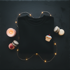 Black crewneck sweatshirt with embroidered cupcake graphic on the front