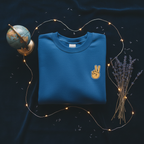Royal blue crewneck sweatshirt with peace-sign hand embroidery detail
