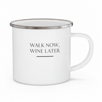 White enamel camping mug with 'Walk now, wine later' text and silver rim