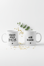 Ceramic coffee mugs pair: one “classic since 1978”, one “still iconic”, star icons
