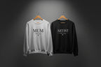 Light gray and black sweatshirts with MUM and ARTIST text, crew neck