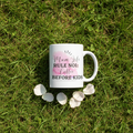 White ceramic coffee mug with pink 'Mum Life Rule No 1: Coffee Before Kids' text