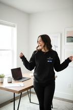 Black crewneck sweatshirt with printed chest logo and long sleeves