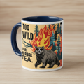Navy ceramic mug with a bear graphic, flames, and “TOO WILD FOR HERBAL TEA.”