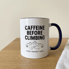 Navy climbing mug on a light oak table in a minimal cottage setting