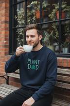 Navy crewneck sweatshirt with 'PLANT' text and plant icon chest graphic