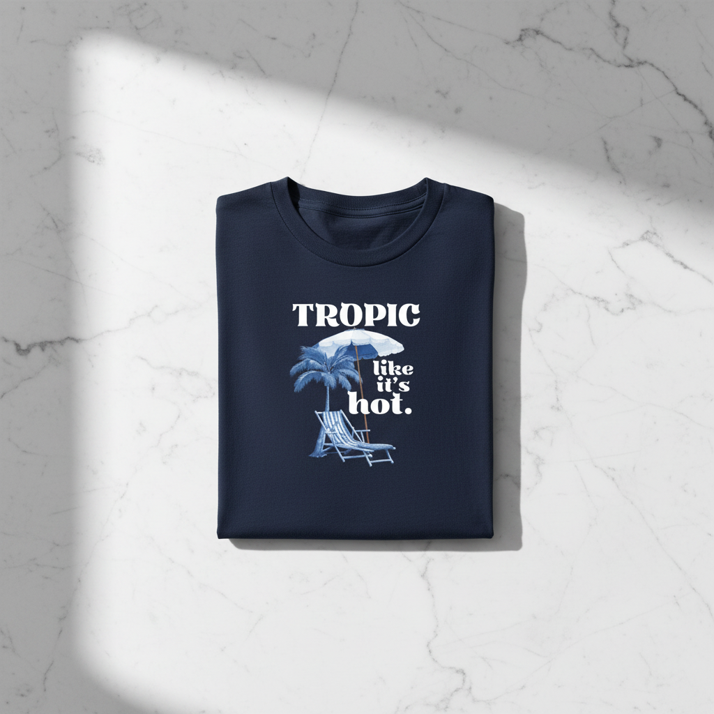 Navy crewneck T-shirt with tropical palm, umbrella, and “like it’s hot” graphic