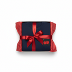Navy crewneck sweatshirt with cherry embroidered patch, neatly folded with ribbon.