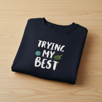 Indigo blue sweatshirt with 'TRYING MY BEST' quote and globe with leaves graphic