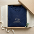 Personalised place name sweatshirt in dark blue with "meet me here" and ST IVES text