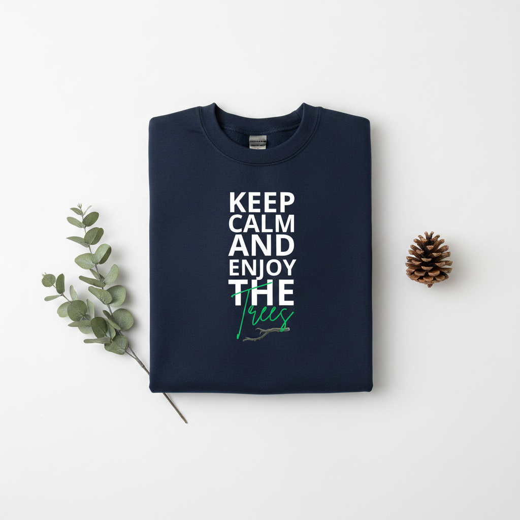 Navy crewneck sweatshirt folded flat with “Keep Calm and Enjoy the waves” front graphic.