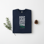 Navy crewneck sweatshirt folded flat with “Keep Calm and Enjoy the waves” front graphic.