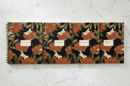 Notebooks in row on marble