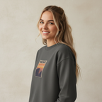 Dark gray crewneck sweatshirt with front graphic print, side view