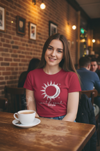 Maroon graphic T-shirt with sun-and-moon emblem print at the chest.
