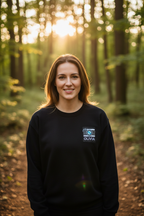 Black sweatshirt with embroidered camera patch and OLIVIA name