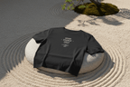 Dark T-shirt with crew neck and “GOOD ENERGY ONLY” graphic on the front