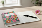 Open notebook showing lined pages with pen