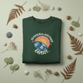 Dark green crewneck sweatshirt with circular space graphic and starburst text