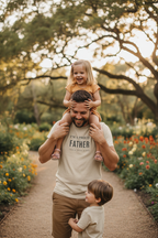 Cream T-shirt with small centered "I'm a proud Father" chest print