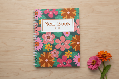 Overhead view of floral notebook with two flowers