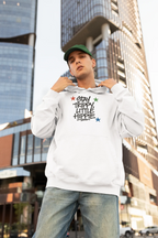 White hoodie with chest "Stay Trippy Little Hippie" star text graphic