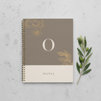 Personalised A5 notebook with gold initial O, floral design, and name OLIVIA on taupe cover