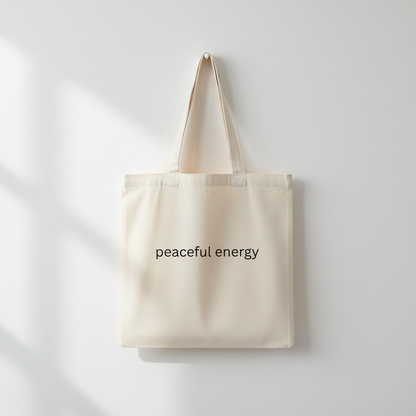 Peaceful energy tote hanging on white wall