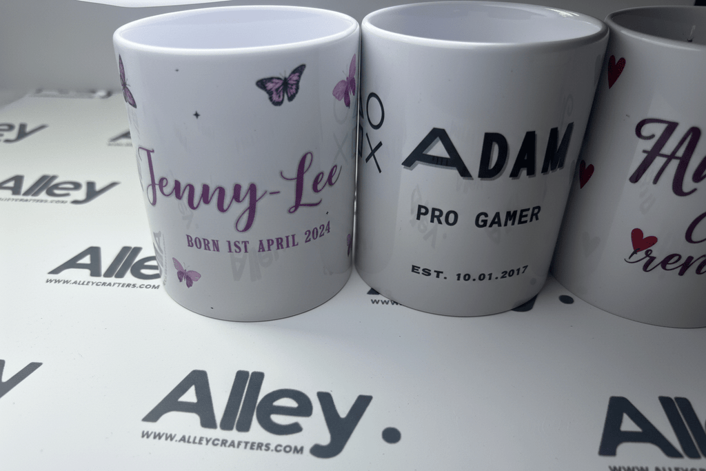 Personalised butterfly mugs with names Jenny-Lee and Adam, white with butterfly prints